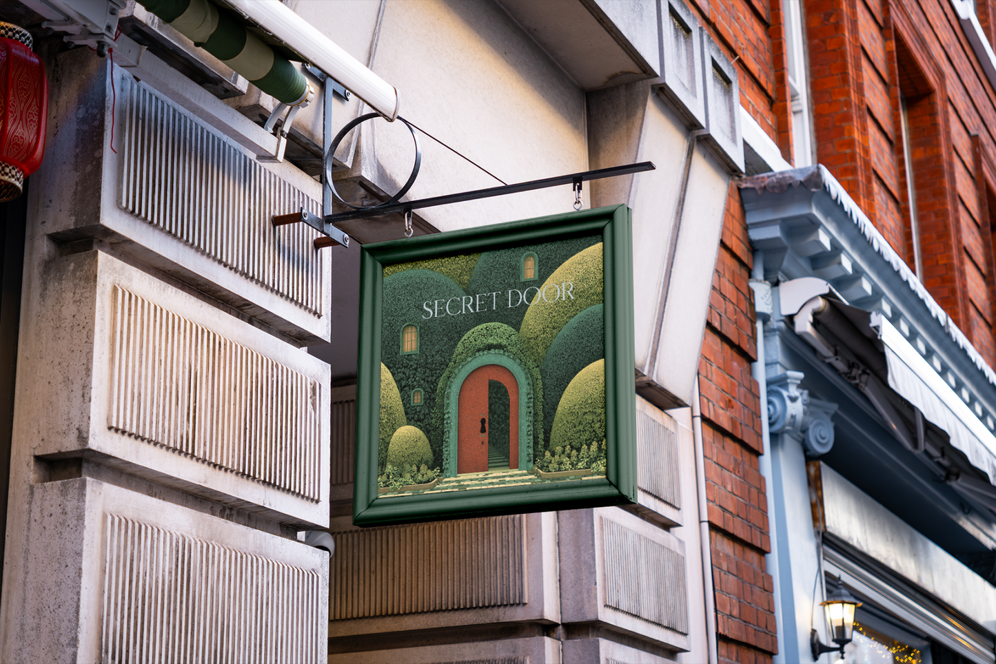 Decorative sign with 'Secret Door' illustration on a building facade