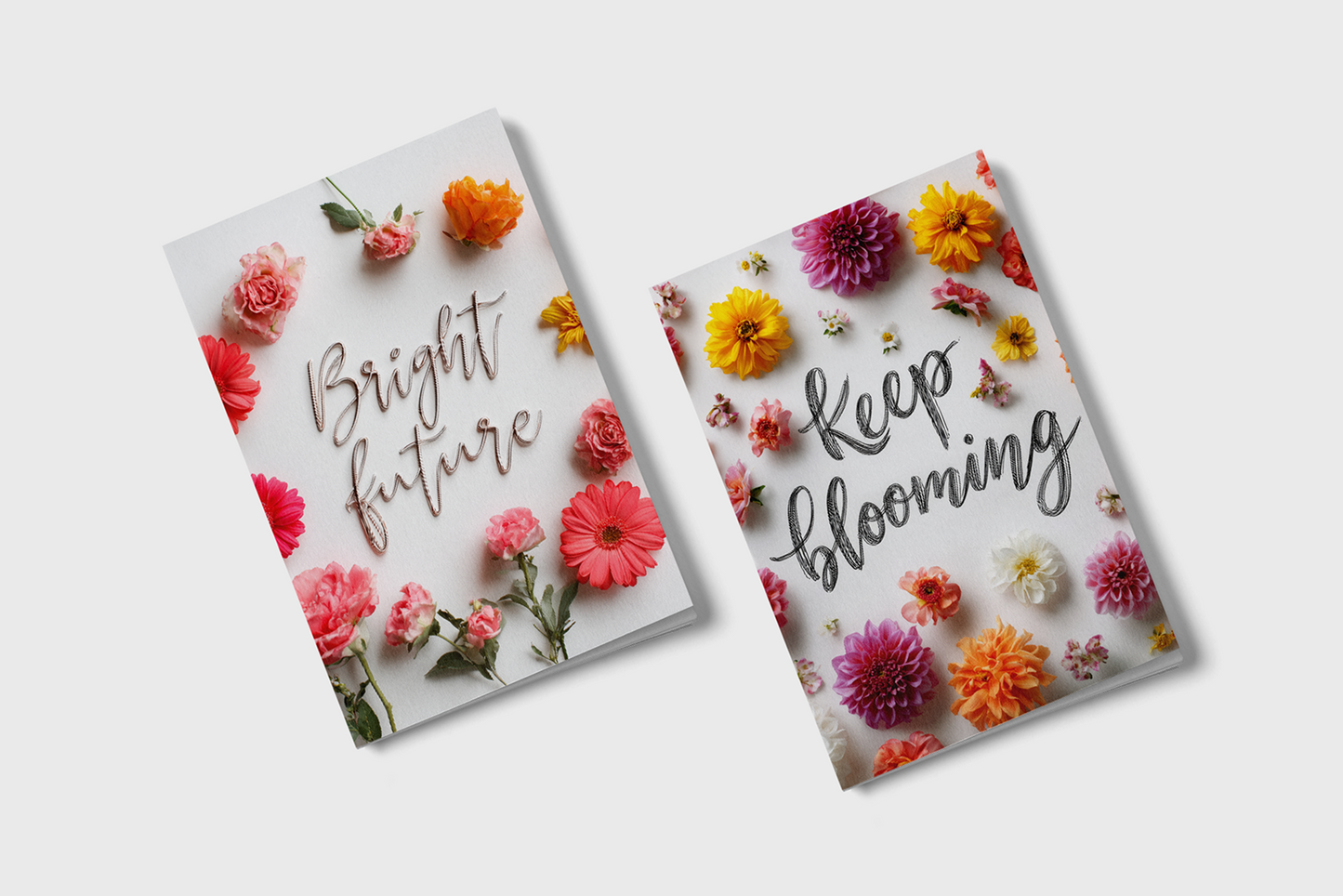 Two greeting cards with floral designs and text on a white background