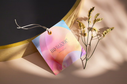 Colorful gift tag with 'Myseulic' text on a neutral background