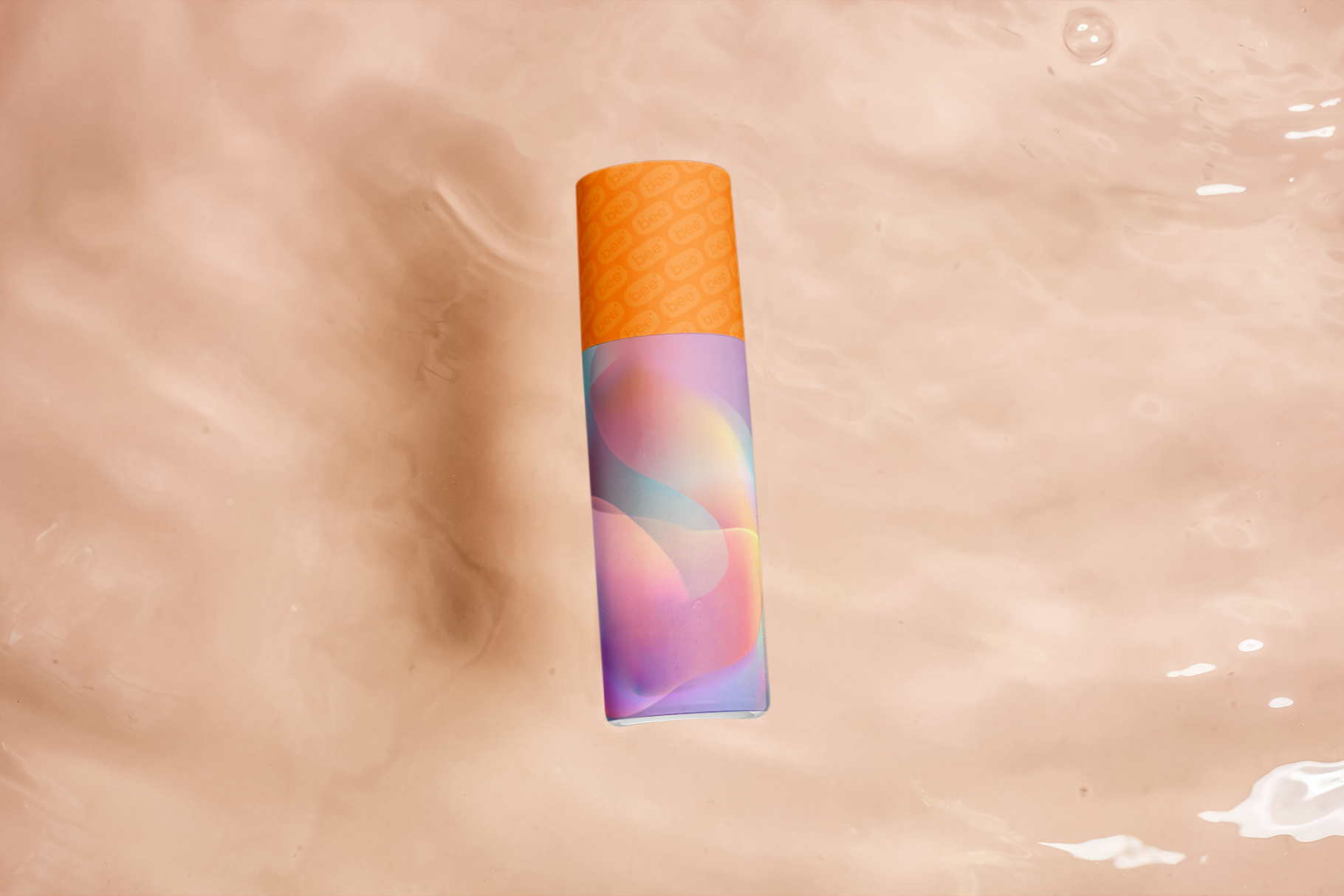 Colorful cylindrical object on a beige background