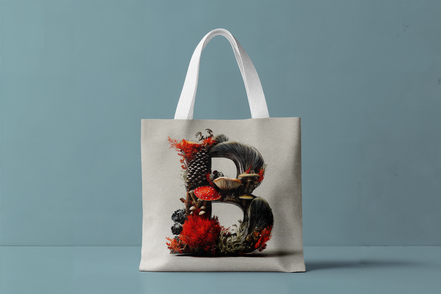 Tote bag with a decorative letter 'B' design on a gray background