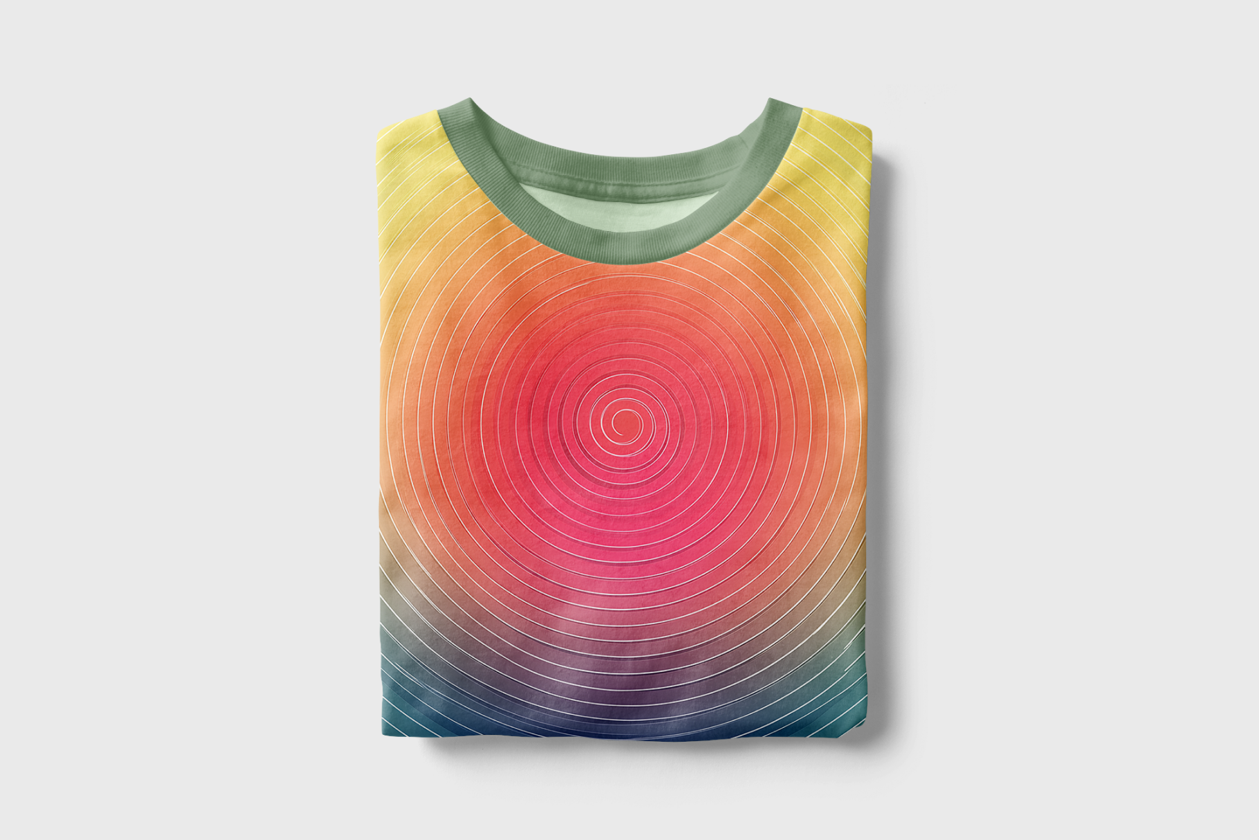 Colorful circular patterned shirt on a light gray background