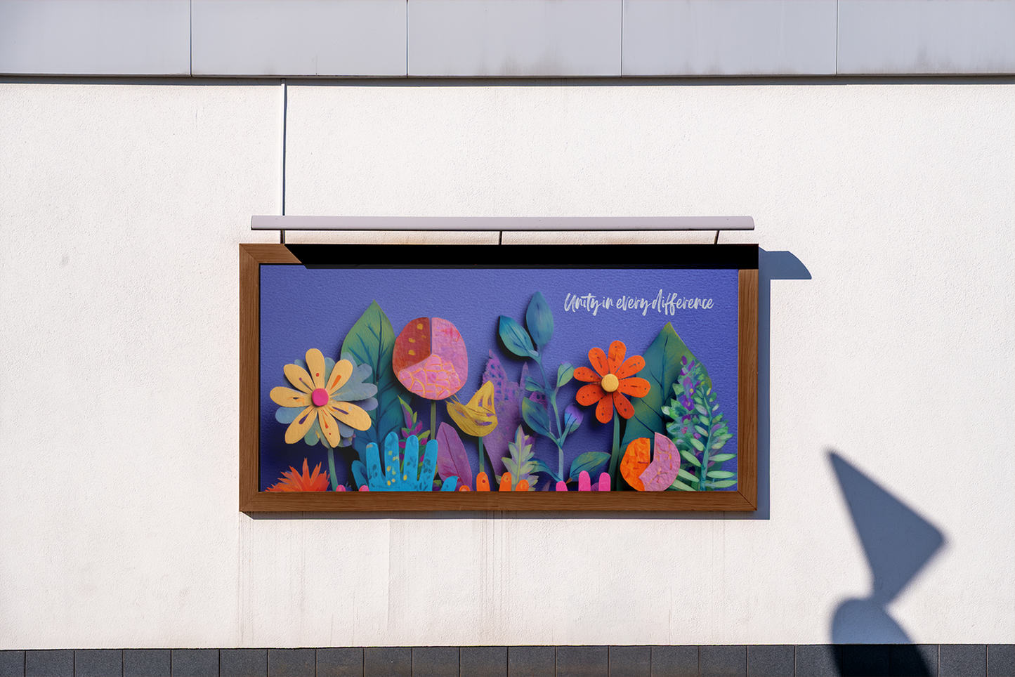Colorful floral design on a digital display against a white wall.