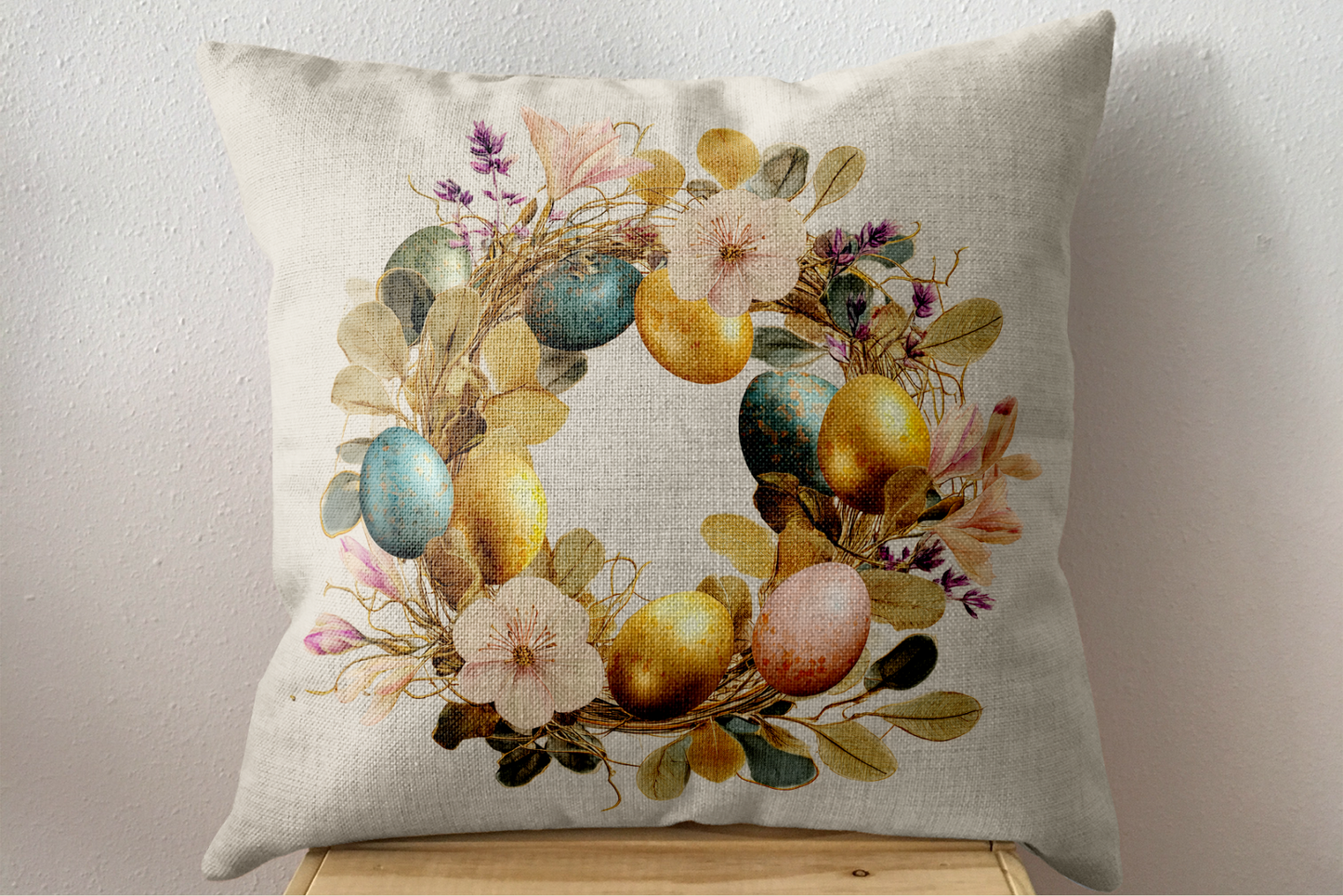 Decorative pillow with floral and egg design on a neutral background
