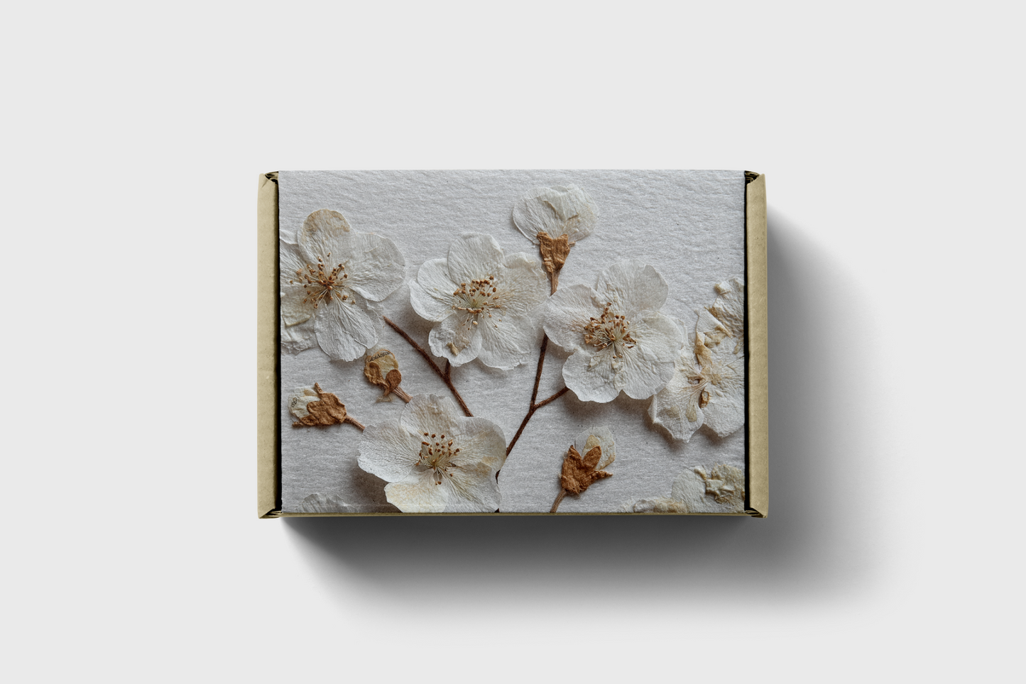 Box with floral design on a white background