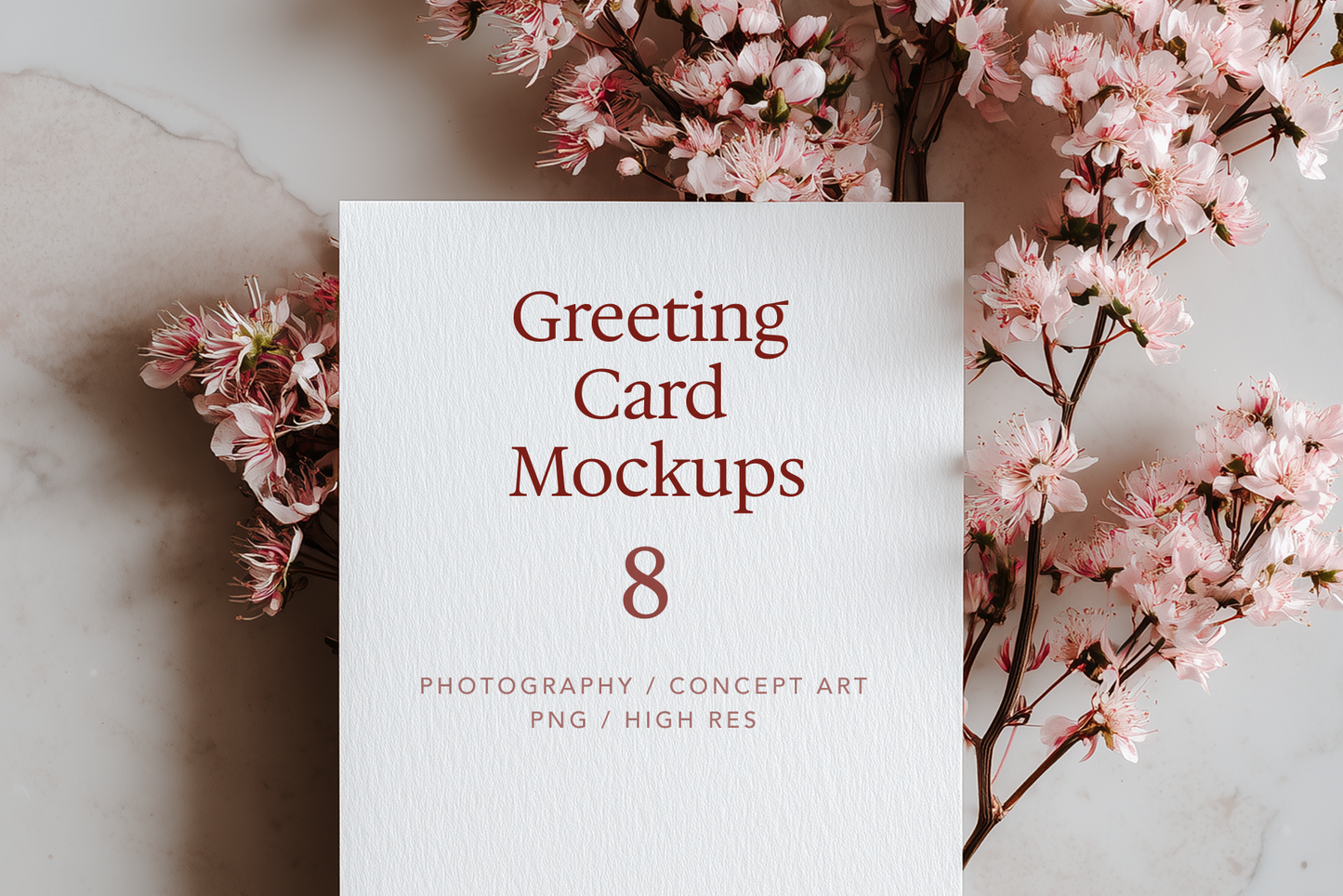 Greeting card mockup with cherry blossoms on a marble surface