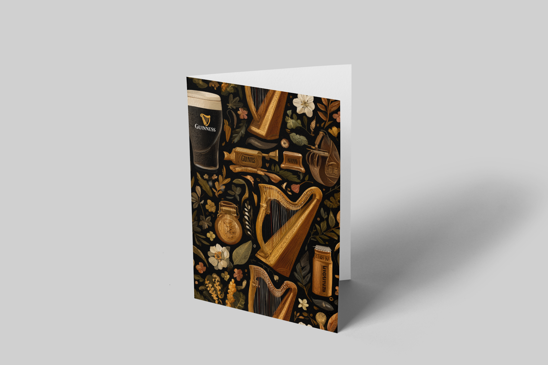 Greeting card with Irish-themed design featuring a harp, beer mug, and other elements on a gray background.