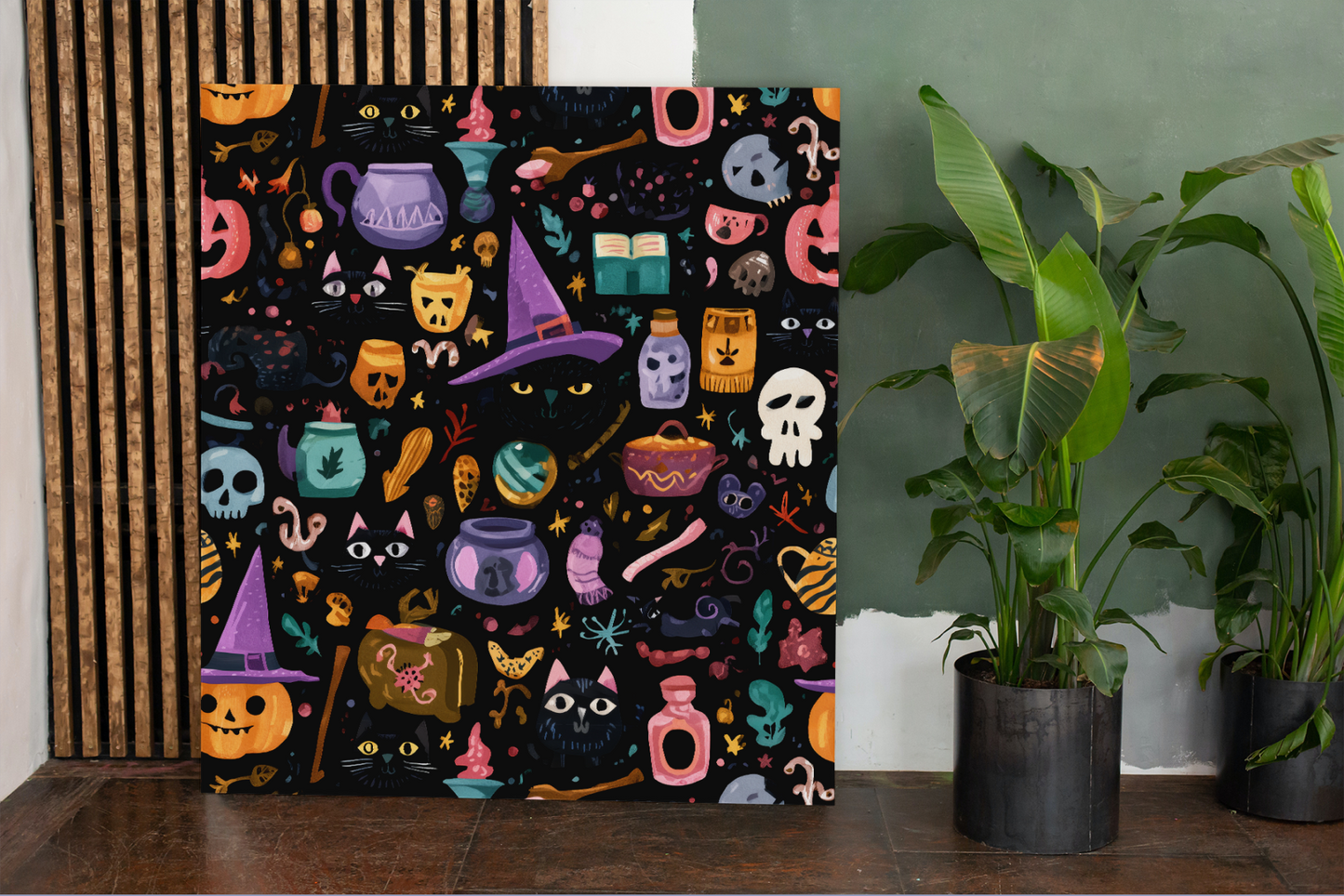 Halloween-themed decorative paper with various spooky illustrations on a black background, placed on a wooden surface.