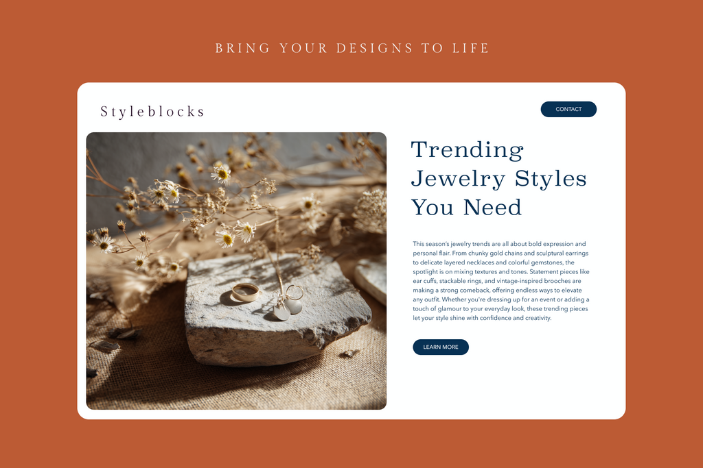 Jewelry website with a stone and dried flowers on an orange background