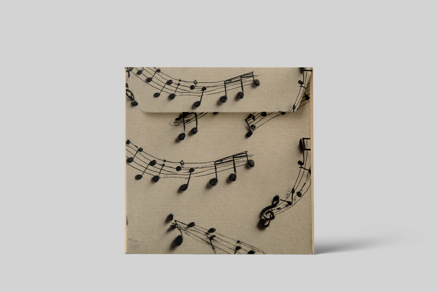 Envelopes with musical notes design on a beige background