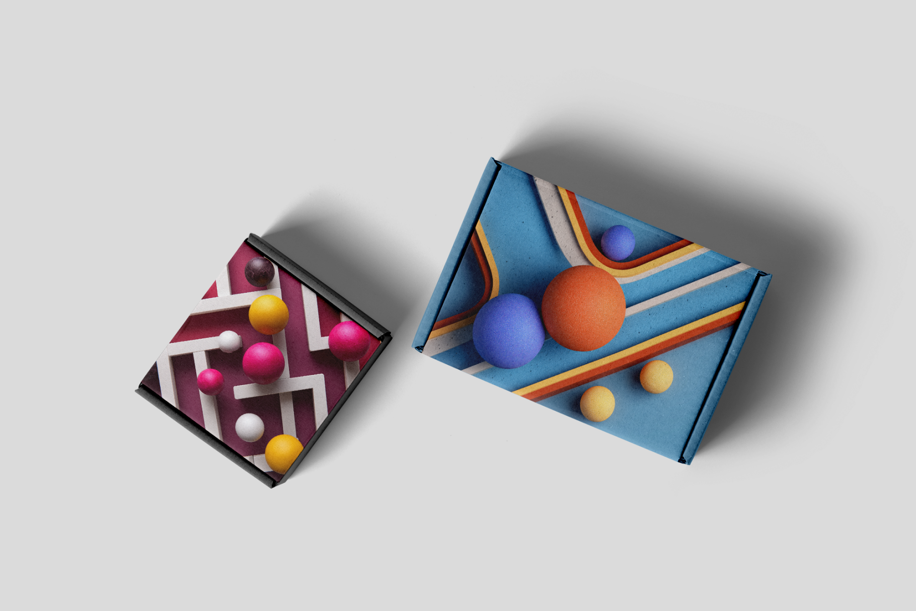 Two colorful makeup palettes with spherical items on a light gray background