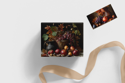 Decorative box with fruit design and a ribbon on a white background