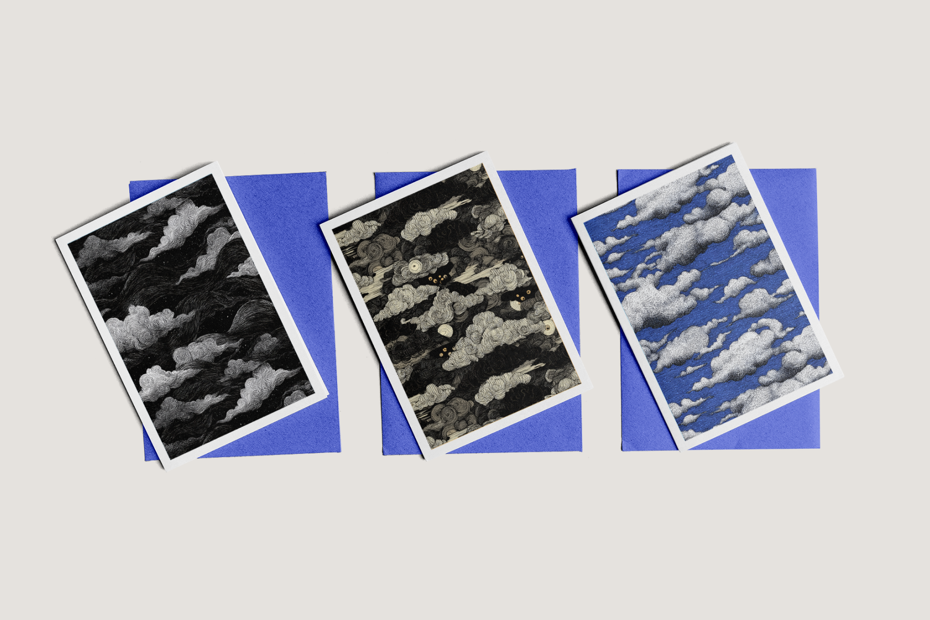 Three cloud-patterned fabric swatches on a blue background