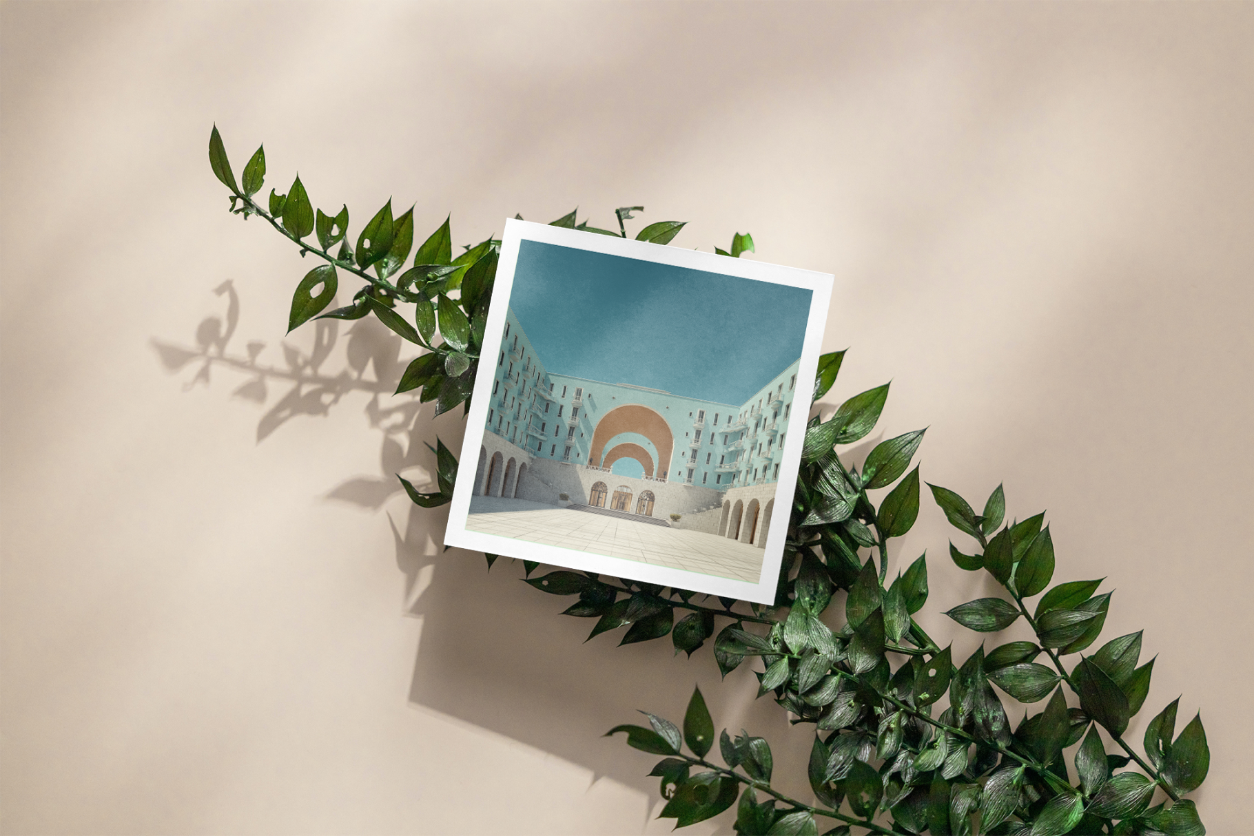 Polaroid-style photo of a building with a rainbow on a branch against a beige background
