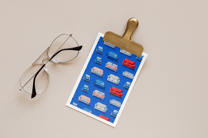 Eyeglasses next to a clip with a colorful product sheet on a beige background