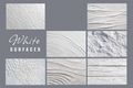 A collage of white textured surface samples on a gray background, with the text 'White SURFACES' in the left panel. The samples show various plaster, stucco, wood grain, and ribbed textures.