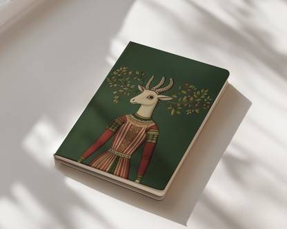 Notebook with a deer in a dress illustration on a green background
