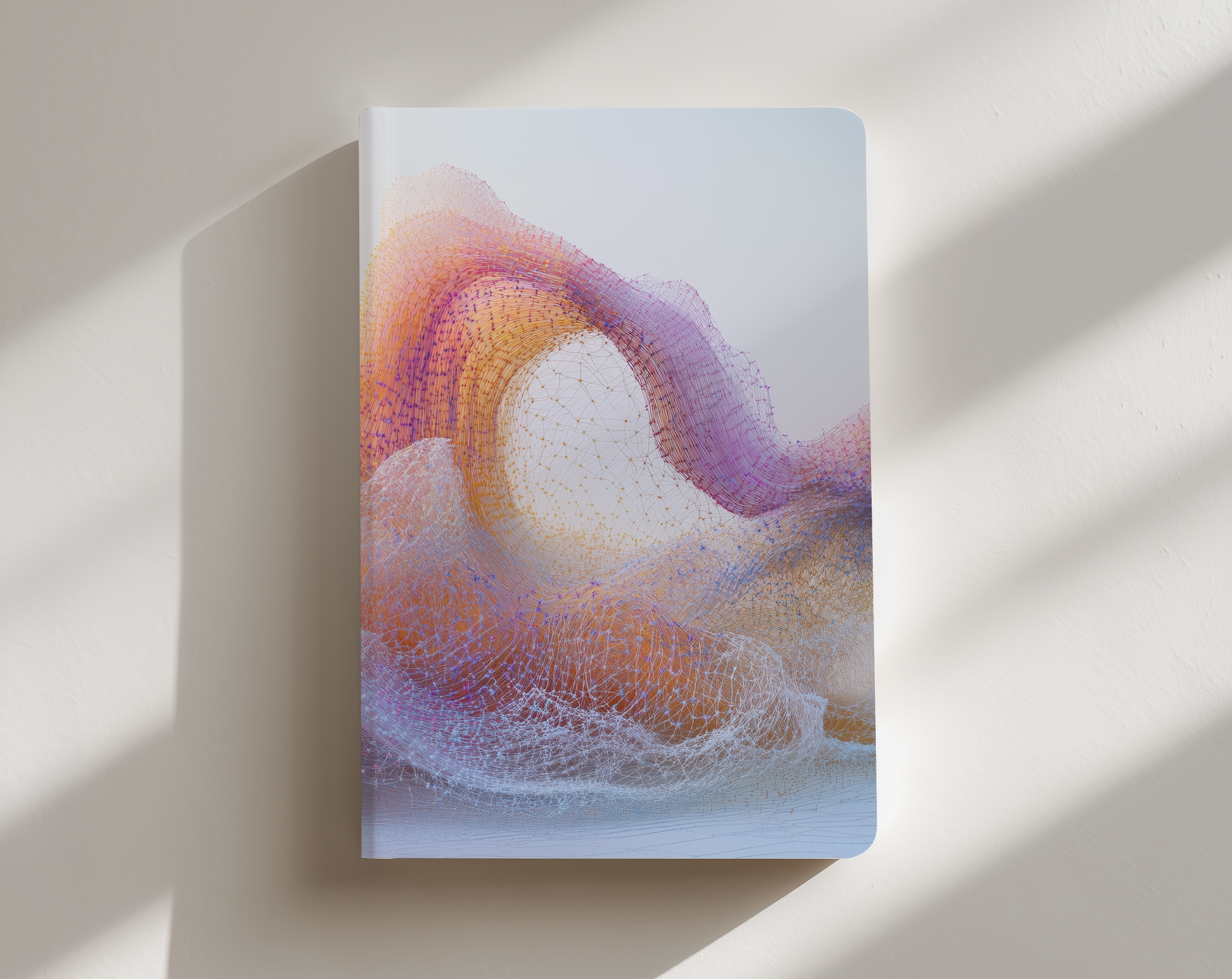Notebook with a colorful abstract design on a light background